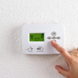 digital thermostat with finger