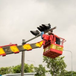 people working on crane