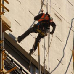 Man working at height with scaffolding